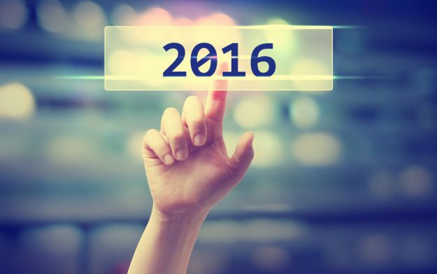 2016 concept with hand pressing a button